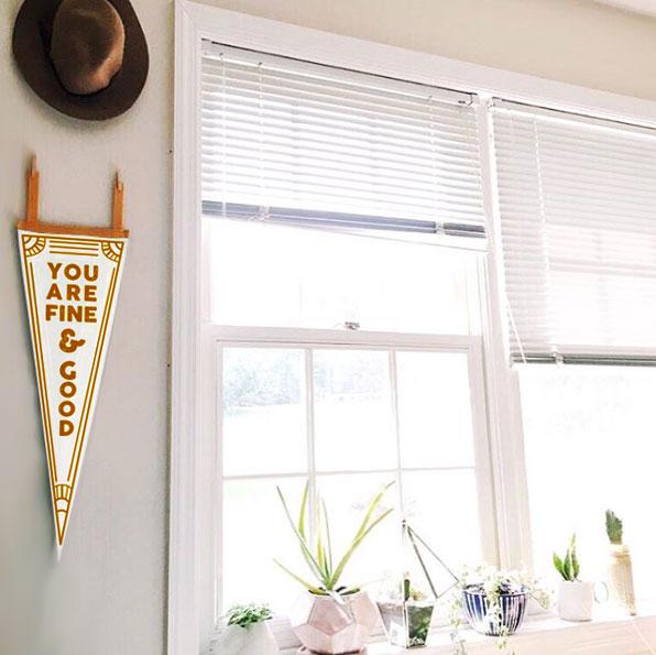 Behind-the-scenes of the Love Everywhere Fine & Good Pennant